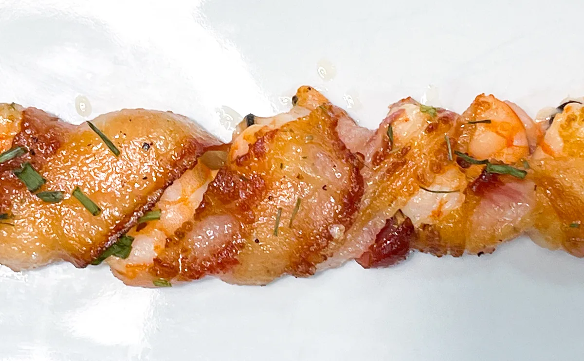 Brocheta de langostinos con Guanciale